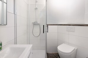 Shower, free toiletries, hair dryer, towels
