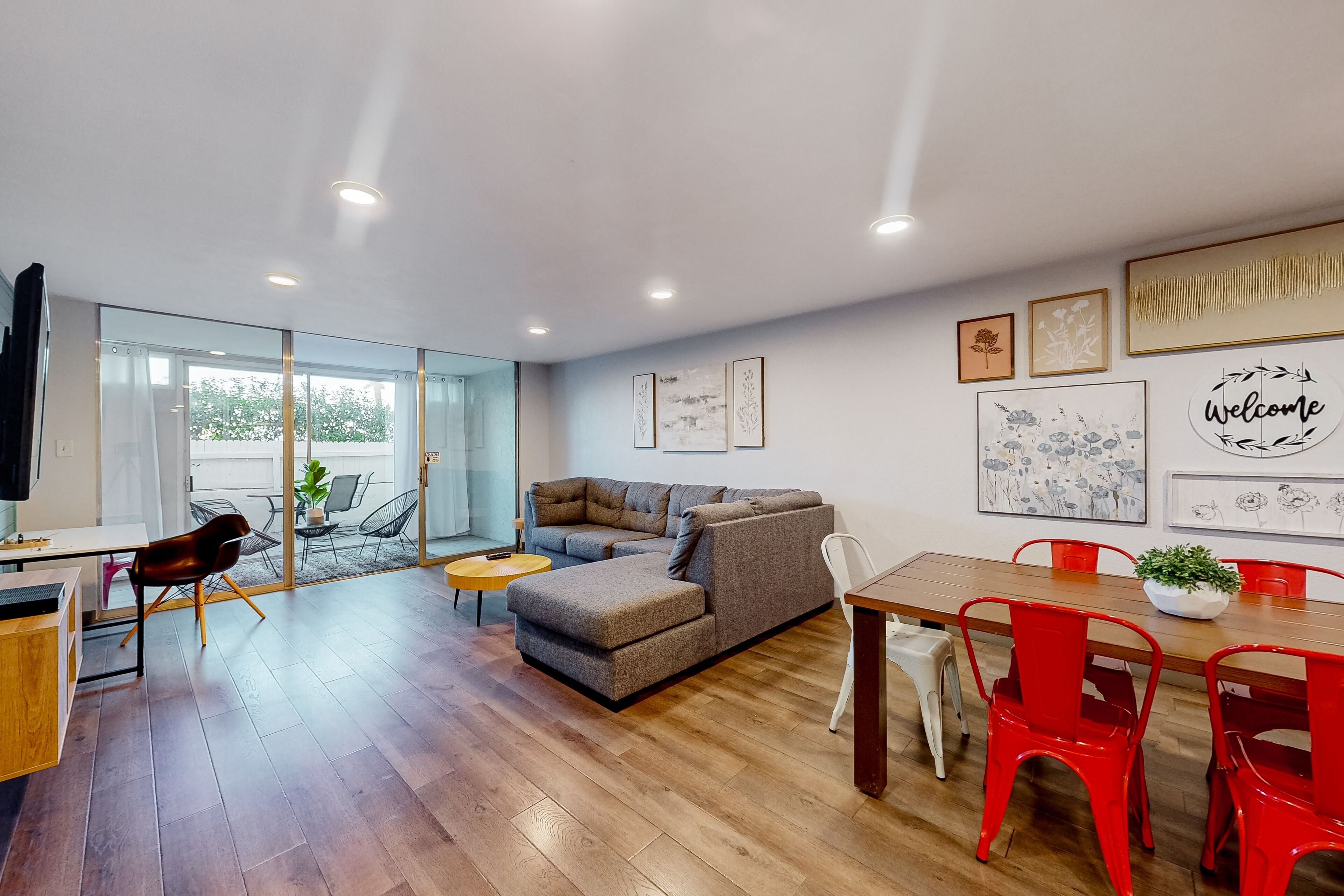 Ground-floor condo with on-site pool, picnic area, & covered patio