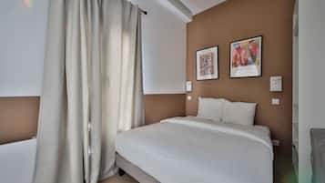 1 habitación, tabla de planchar con plancha, wifi gratis y ropa de cama