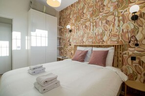 1 slaapkamer, een strijkplank/strijkijzer, reisbedje, wifi