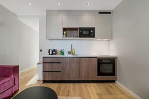 Microwave, oven, coffee/tea maker, cookware/dishes/utensils