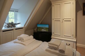 2 habitaciones, tabla de planchar con plancha, wifi y ropa de cama 