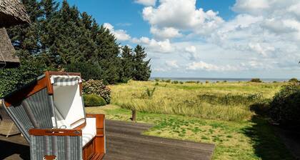 Horizont - Doppelhaushälfte in Bestlage unter Reet mit privatem Weg zum Watt