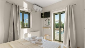 A modern bedroom with a large bed, a TV mounted on the wall, and a view of an outdoor swimming pool. - Villa Nora in Ditiki Mani (West Mani)