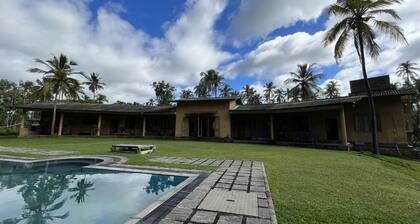 outdoor swimming pool with a picturesque garden for you to explore