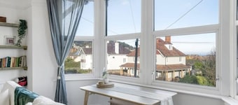 Bright Apartment w/ Parking & Distant Sea Views