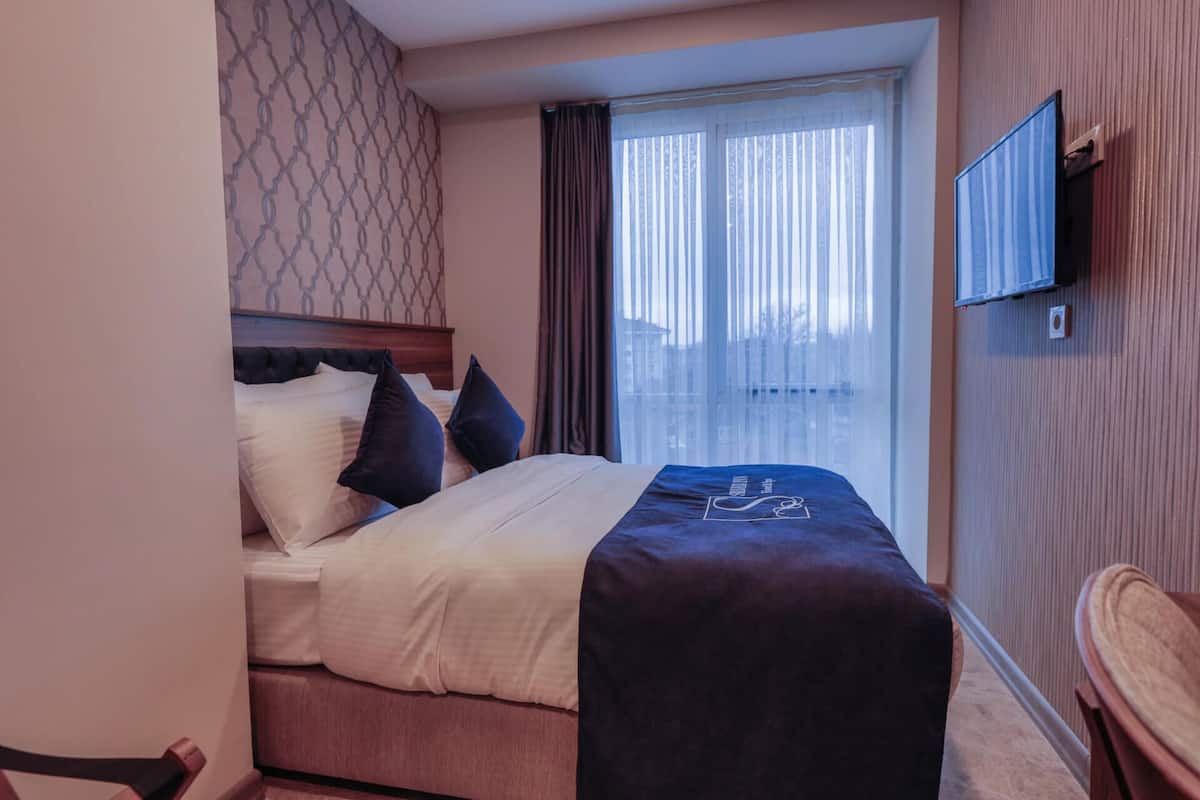 2 slaapkamers, luxe beddengoed, een minibar, een kluis op de kamer