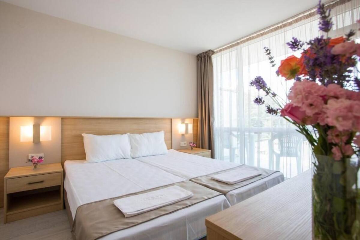 Basic Twin Room | Desk, blackout drapes, iron/ironing board (on request), WiFi (free)