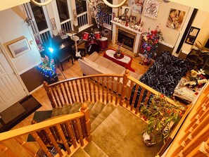A multi-level living space with a staircase, a fireplace, and a Christmas tree. - RVH'S/Rm A
Good location, 45minutes fromYVR Airport (Surrey)