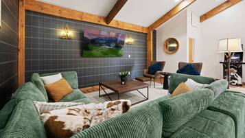 Smart TV, fireplace, foosball, books