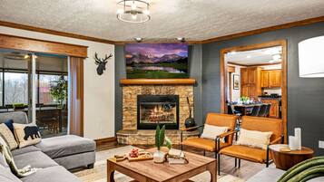 Smart TV, fireplace, foosball, books