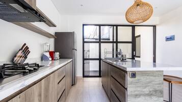 Villa | Private kitchen | Fridge, microwave, stovetop, electric kettle