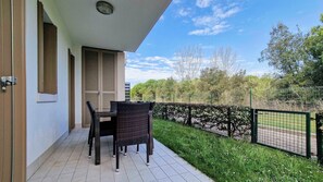 Balcony - Lovely Apartment Overlooking the Pool in Bibione (San Michele al Tagliamento)