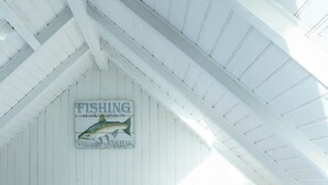 A spacious attic bedroom with a large bed, a welcome sign, and a view of the sky. - Ty Penty - Small cocoon for 2 by the sea (Porspoder)