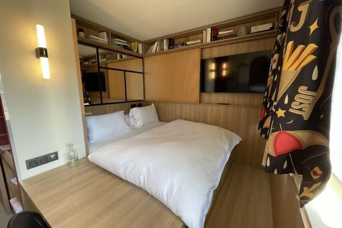 1 slaapkamer, verduisterende gordijnen, geluiddichte muren, reisbedje