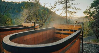 Off-grid tiny home on 6 secluded acres w/ outdoor soaking tubs and sauna!