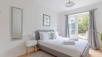 1 bedroom, laptop workspace, bed sheets