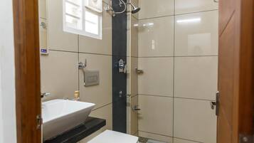 Deluxe Double Room | Bathroom | Shower, rainfall showerhead, eco-friendly toiletries, heated floors