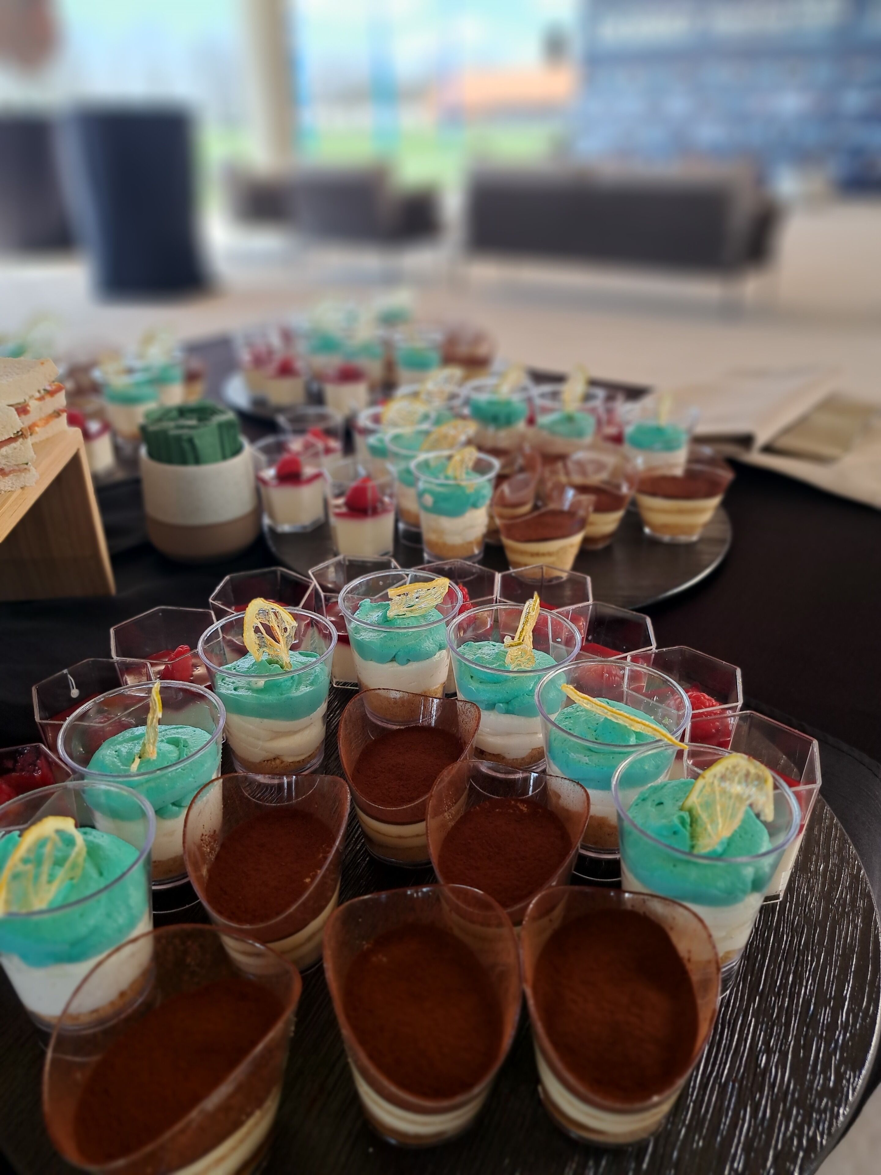 A variety of desserts arranged on a table.