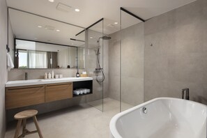 Premium Suite | Bathroom | Rainfall showerhead, hair dryer, bathrobes, slippers