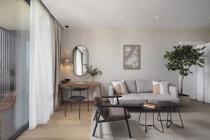 Premium Suite | Living area | 55-inch Smart TV with cable channels