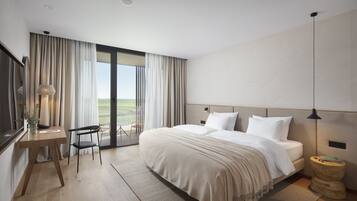 Premium bedding, down comforters, memory foam beds, minibar