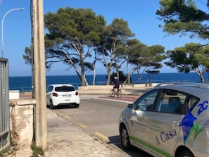 Park your car and explore the scenic coastal route.