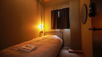 Basic Single Room | Blackout drapes, iron/ironing board, free WiFi, bed sheets