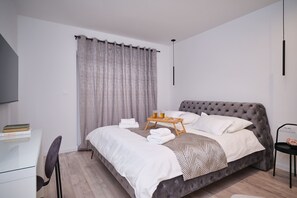 2 chambres, fer et planche à repasser, lit parapluie, Wi-Fi gratuit