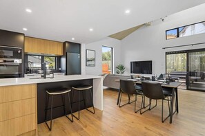 Fridge, microwave, oven, stovetop - Inn Sophia | Two Luxurious Homes with Spa Pools (Rotorua)