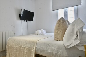2 habitaciones, tabla de planchar con plancha y wifi gratis 
