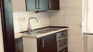 Apartment | Private kitchen | Fridge, microwave, oven, stovetop