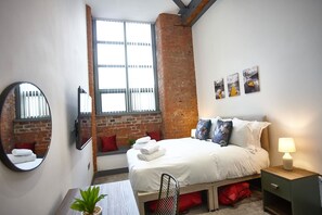 1 bedroom, desk, iron/ironing board, travel cot