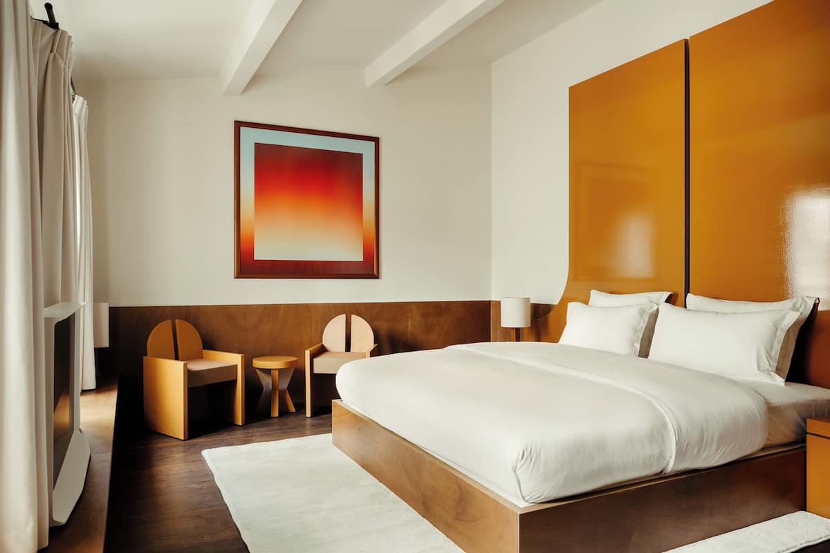 Premium bedding, memory-foam beds, desk, laptop workspace