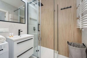 Shower, hair dryer, shampoo