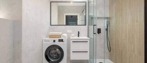 Shower, hair dryer, shampoo
