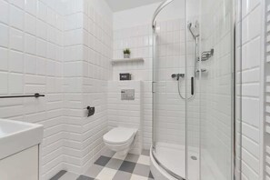 Regadera y secadora de cabello 