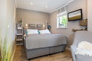 1 dormitorio, tabla de planchar con plancha, wifi gratis y ropa de cama