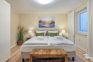 2 dormitorios, tabla de planchar con plancha, wifi gratis y ropa de cama