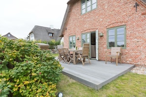 Enjoy a peaceful retreat with a patio and garden, perfect for relaxing with a view.