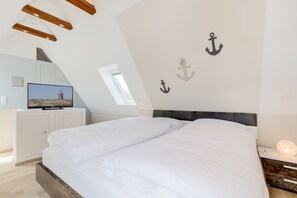 2 slaapkamers, een strijkplank/strijkijzer, gratis wifi, beddengoed