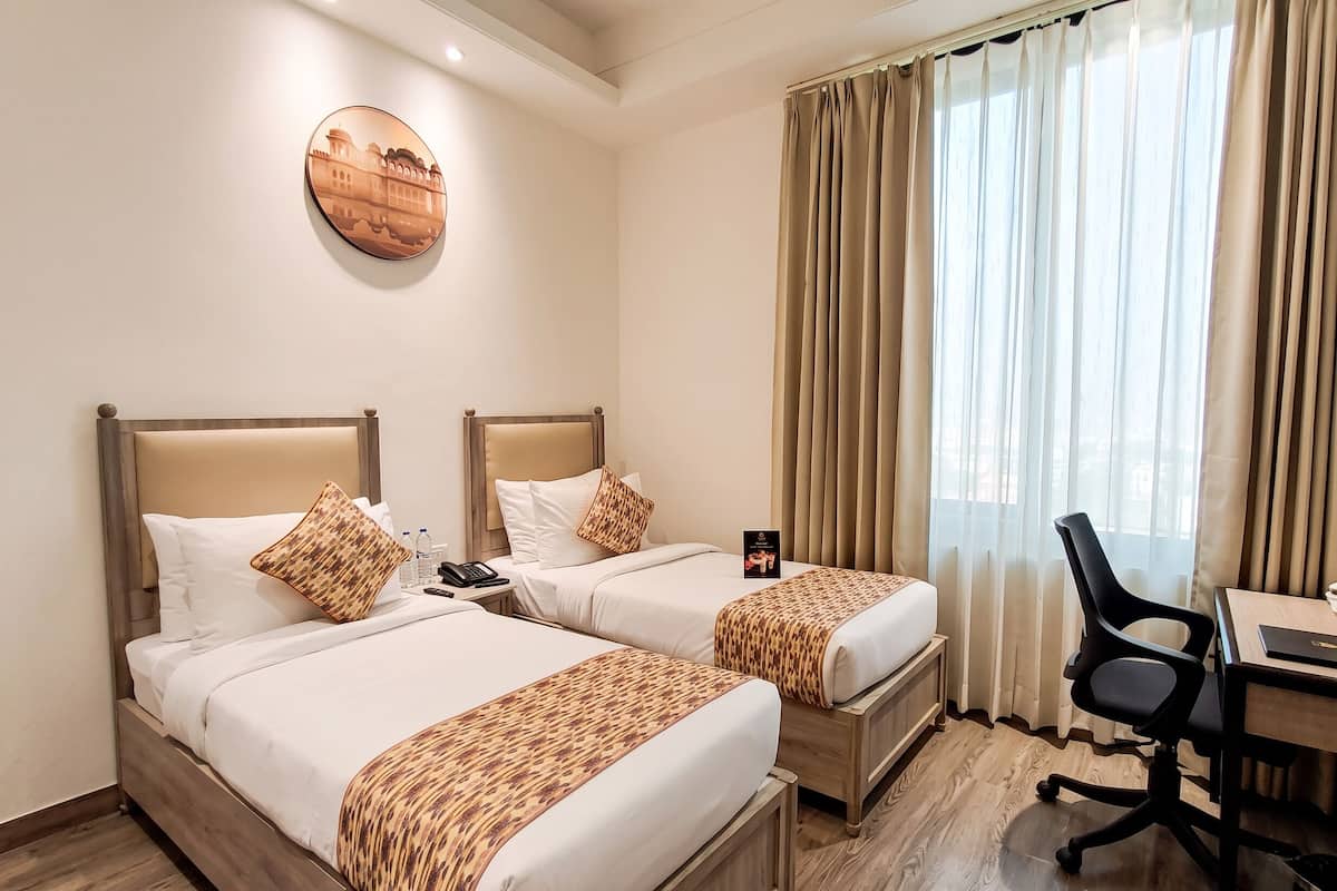 Deluxe Suite Twin Bed with Living Room, with Complimentary Hi-Tea & 1 Pint of Beer | City view