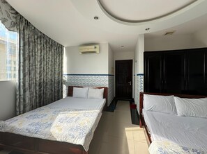 Family Quadruple Room | Free WiFi, bed sheets - OYO 1223 Vt New Day Hotel (Da Nang)