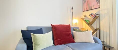 Basic Apartment | Living area | 25-cm Smart TV with satellite channels