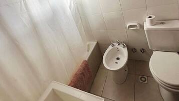 Bidet, towels, soap, shampoo