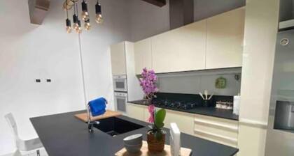 Open apartment space.In quiet residence 5 minutes from Malpensa.