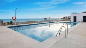 A rectangular swimming pool with a metal railing, a lifebuoy, and a clear sky. - Panoramic Terrace w/pool by Costarentals - Ref 43 (Benalmádena)