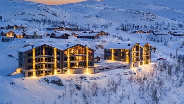 A snow-covered lodge with multiple buildings, likely offering lodging and possibly ski-related amenities. - Gausta Residence (Tinn)