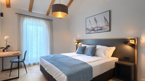 4 chambres, coffre-fort, fer et planche à repasser