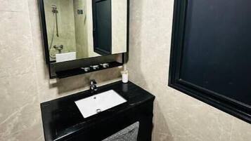 Hair dryer, towels, soap, toilet paper